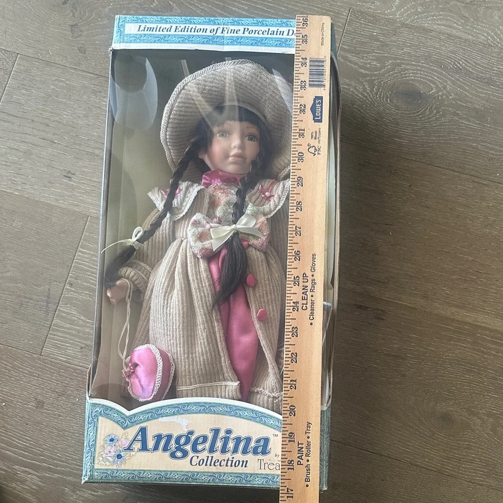2001 Porcelain Doll with Pink Dress and Tan Coat